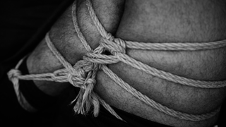 Man doing Shibari