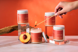 peach and cream melt massage candle collection