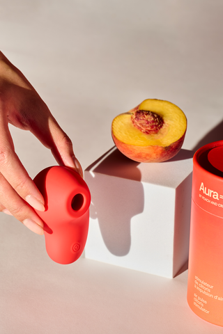peach and cream clitoral suction vibrator aura