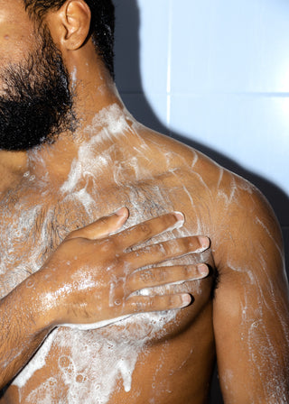 man in shower before prostate stimulation