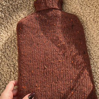 a knitted hot water bottle