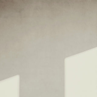 window light falling on a pale wall