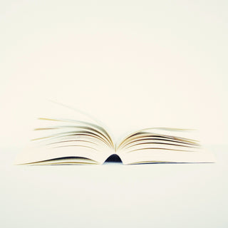 an open book on white