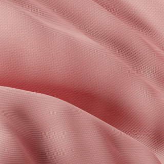 Folds of soft pink silk fabric