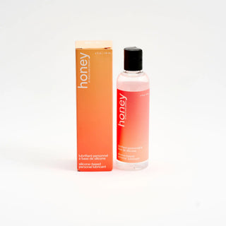 peach & cream honey silicone personal lubricant - product close-up