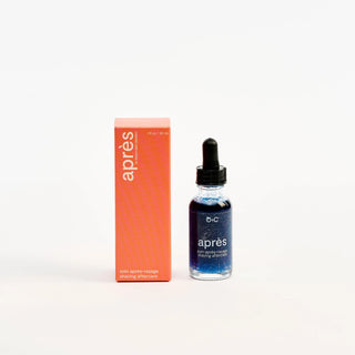 Bottle and box of Peach and Cream 'après' shaving after care product on a white background