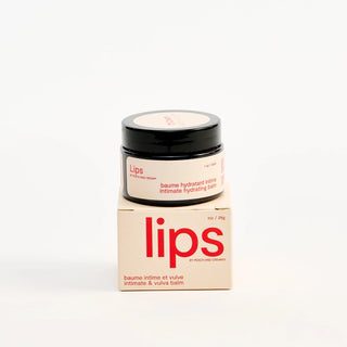 Jar of Peach and Cream 'lips' vulva balm with packaging on a white background