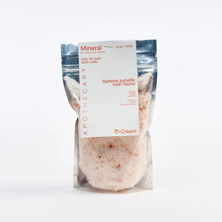 Packaged bath salts with Peach and Cream brand label on a white background