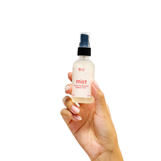 Bottle and box of Peach and Cream 'mist' skin balancing spray product 