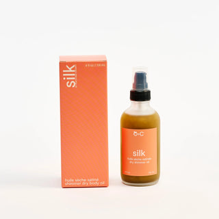 Peach and Cream Silk dry body oil bottle and packaging on a white background